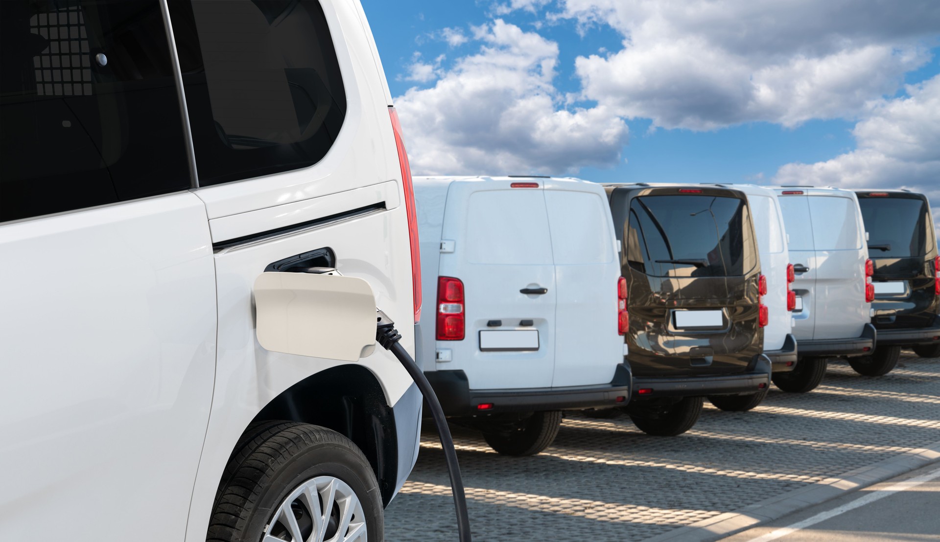 Electric delivery vans with electric vehicles charging station.
